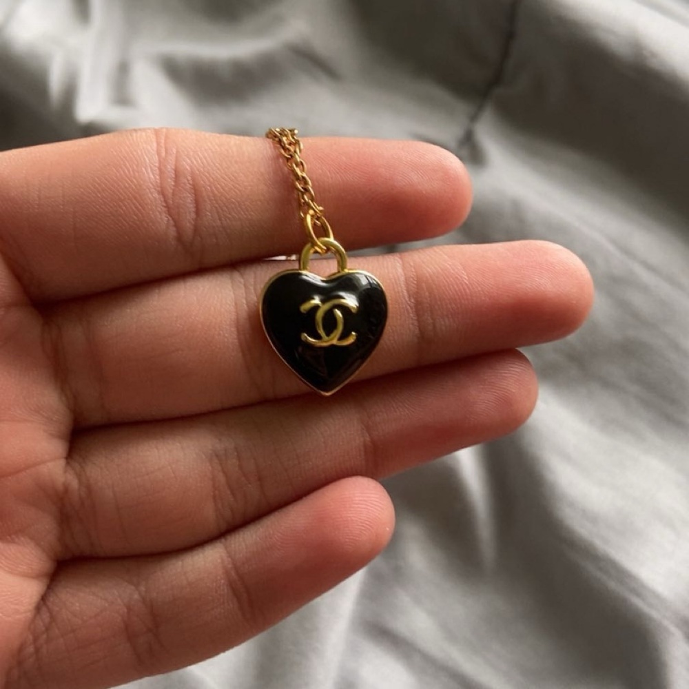 CHANEL Black and Gold Heart Necklace